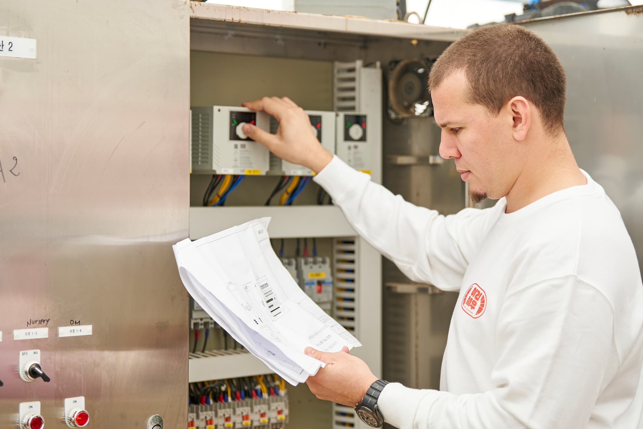 Technician monitoring automated water quality control system